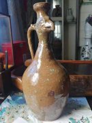 北宋米黄釉龙柄凤首壶